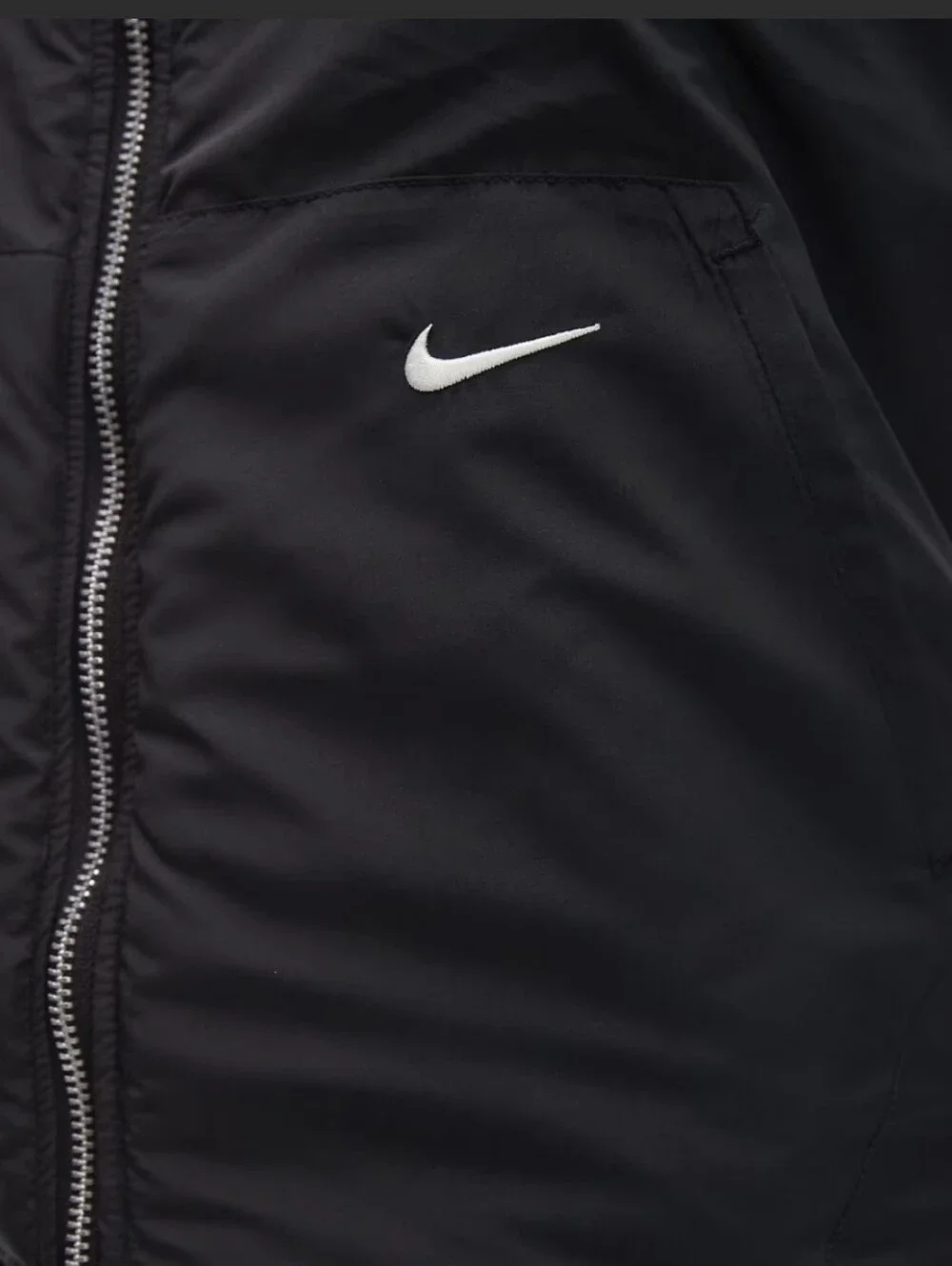 Nike Street reversible sherpa vest in black and leopard print